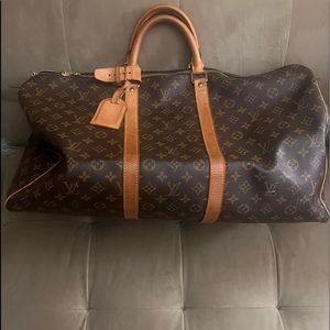 LOUIS VUITTON
MONOGRAM CANVAS KEEPALL BANDOULIÈRE 60
